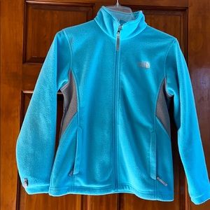 Girls North Face zip- up jacket (L)